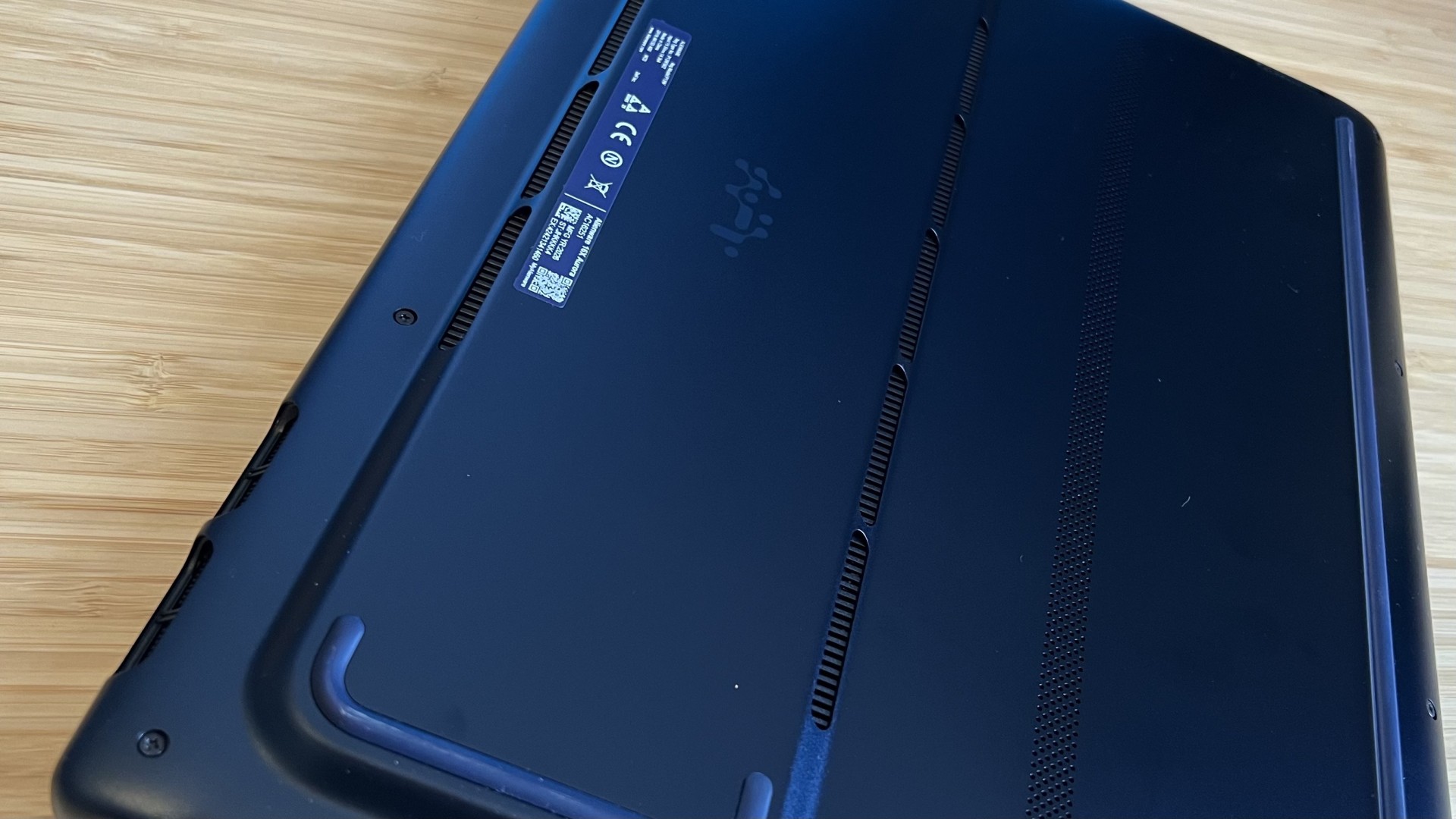 Close up on back panel of Alienware 16X Aurora 2026 gaming laptop showing Phillips Head screws holding chassis together