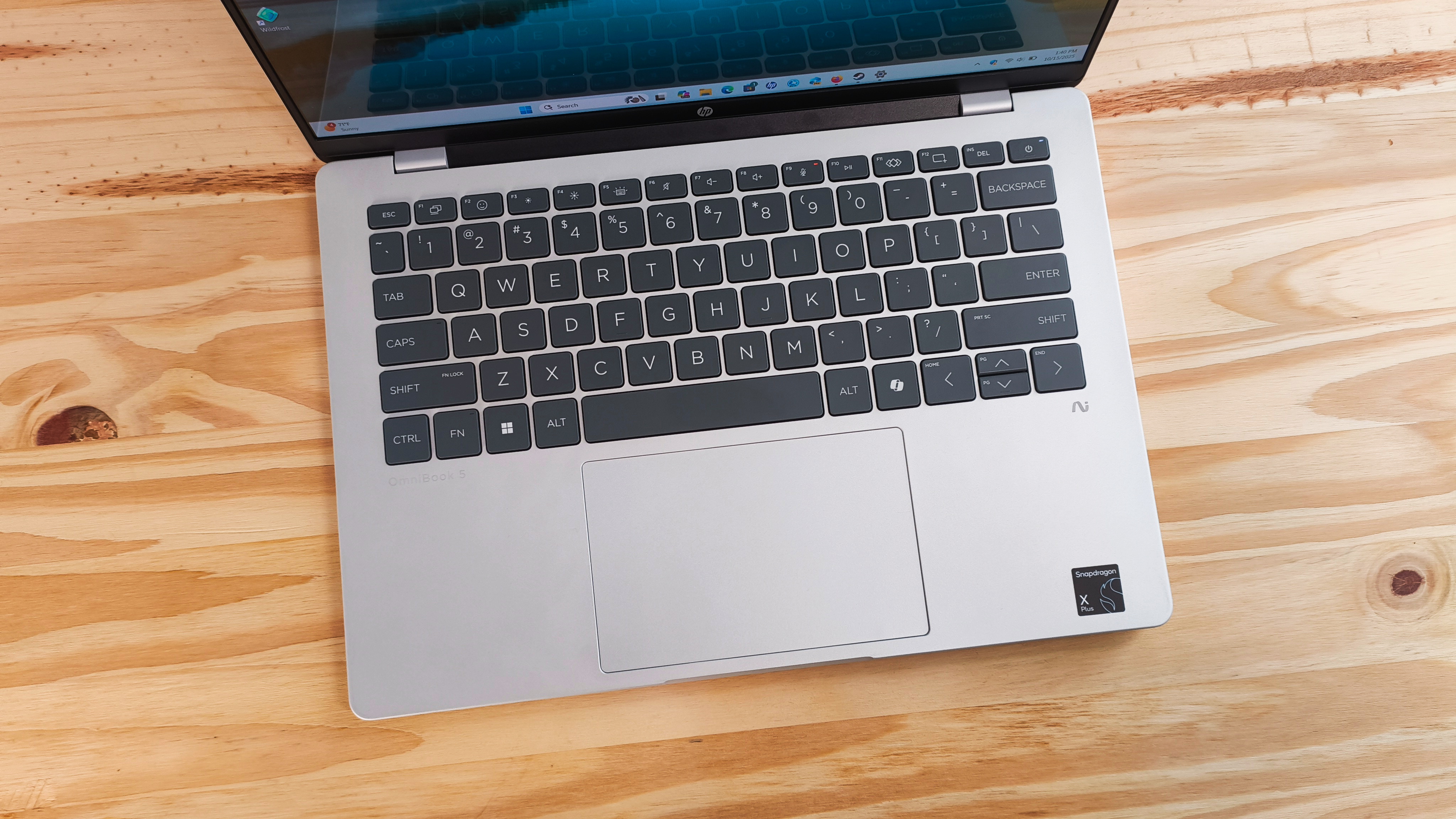 An HP OmniBook 5 14 Inch Next Gen AI PC on a desk