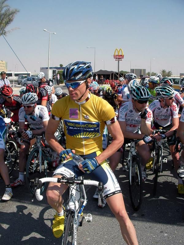 Race leader Wouter Mol (Vacansoleil) shows his gold jersey.