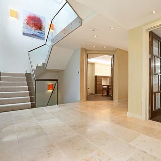 glass stairway with tiled floor
