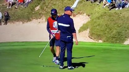 DeChambeau's gimme gesture