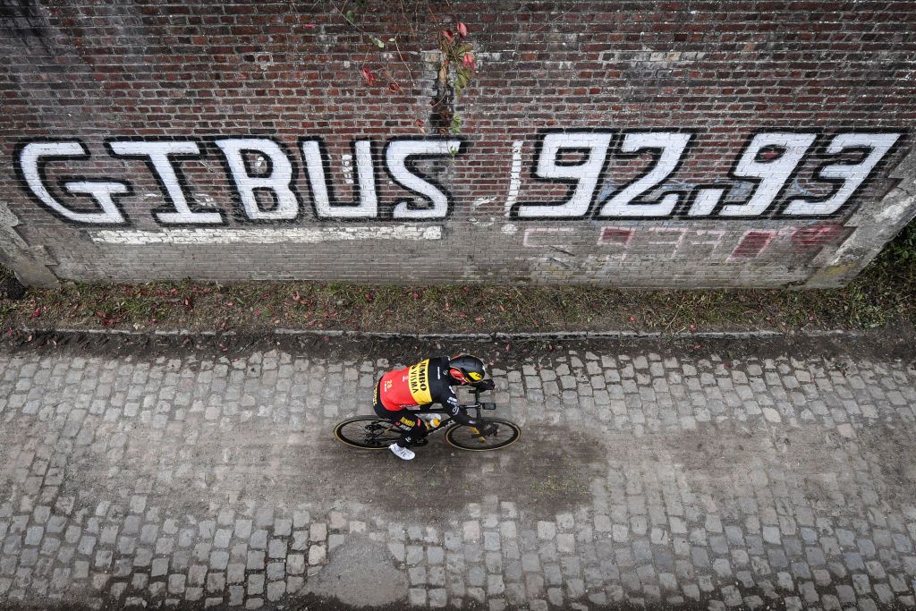 Belgian Wout Van Aert of Team JumboVisma rides underneath the Pont Gibus during a training session ahead of the 118th edition of the ParisRoubaix one day cycling race from Compiegne near Paris to Roubaix Thursday 30 September 2021 Due to the ongoing corona virus pandemic the 2020 edition was cancelled and the 2021 edition was postponed from spring to autumn For the first time there will be a womens race ParisRoubaix as well BELGA PHOTO DAVID STOCKMAN Photo by DAVID STOCKMANBELGA MAGAFP via Getty Images