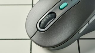 A black Logitech Signature AI Edition M750 wireless mouse