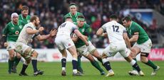 Ireland's CJ Stander is tackled by England's Owen Farrell