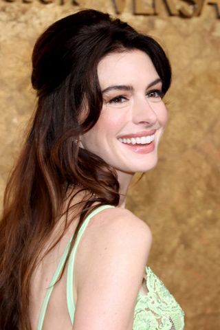 Anne Hathaway has curtain bangs at the Clooney Foundation For Justice's "The Albies" on September 28, 2023 in New York City.