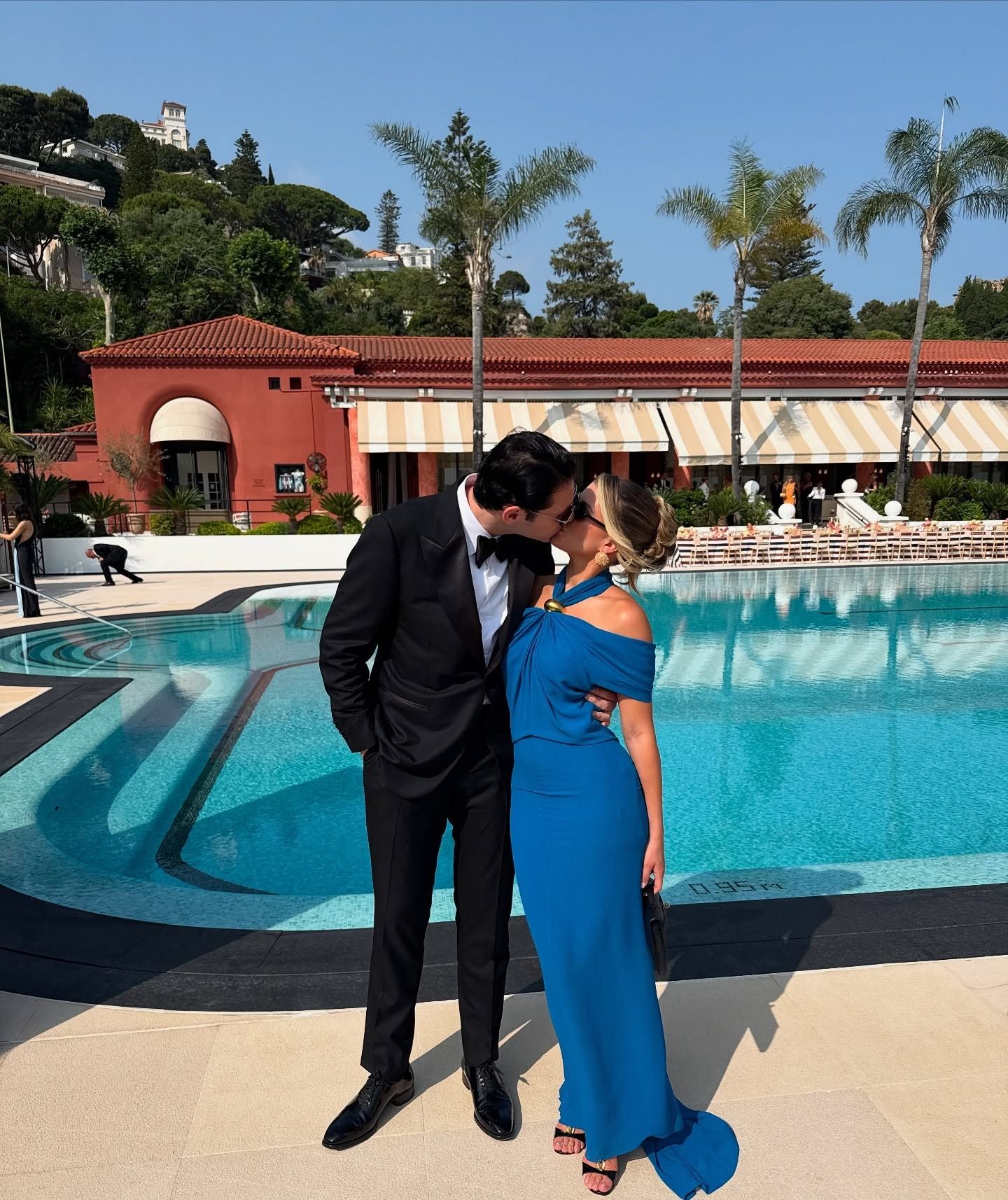 Sofia Grainge wears a blue wedding guest dress for her petite frame