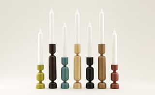 'Lumberjack' candlestick holders, by SImon Legald for Normann Copenhagen. Different sized cylindrical segmented candlestick holders in various colours.