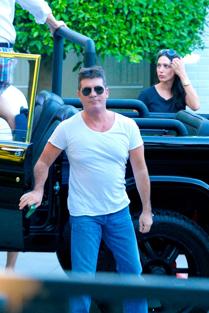 Simon Cowell and Lauren Silverman drive around LA in 2012