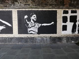 Artwork of soccer player Declan Rice outside Arsenal's stadium