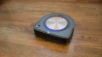 The iRobot Roomba s9+ vacuuming a hardwood floor
