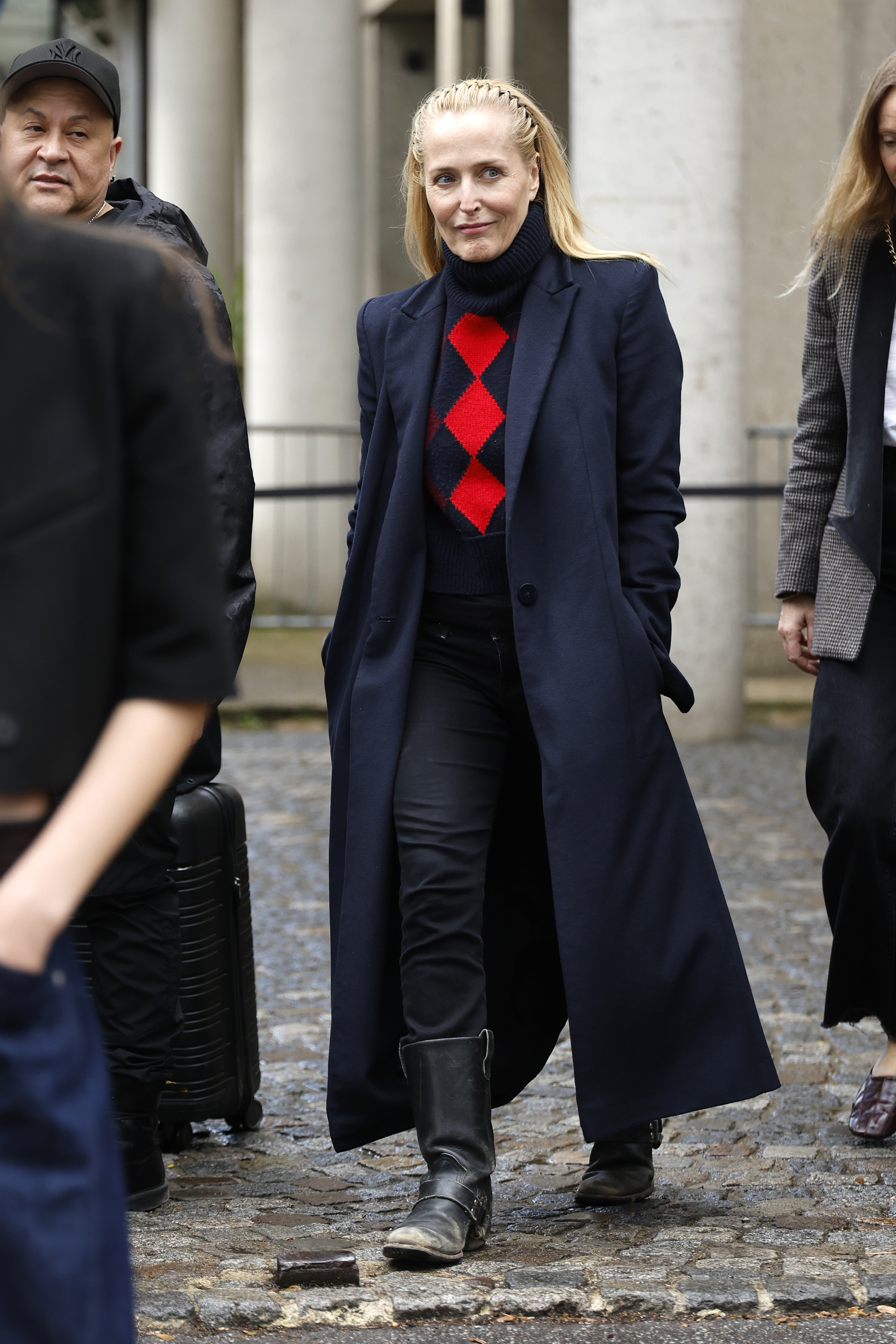 Gillian Anderson was spotted in a two-tone argyle sweater after walking in the Miu Miu Fall 2026 show
