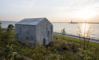 A concrete cabin on The Hills of Govenors Island
