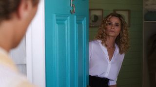 Kyra Sedgwick as Aunt Julia opening the door in The Summer I Turned Pretty season 2