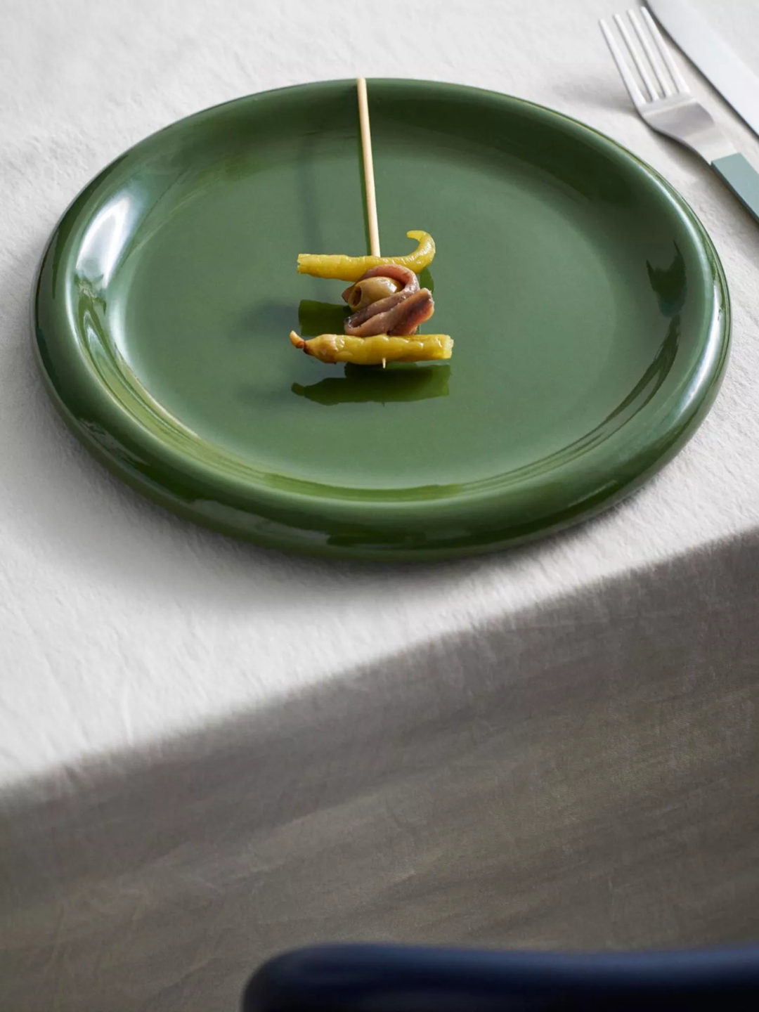 A green bubbled plate from HAY