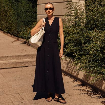 woman wearing a black dress
