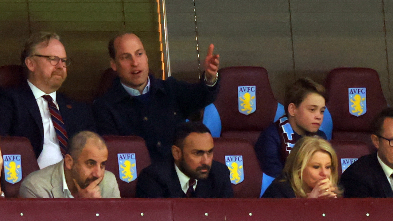 Prince William, Prince of Wales and Prince George of Wales look on during the UEFA Europa Conference League 2023/24 Quarter-final first leg match between Aston Villa and Lille OSC at Villa Park on April 11, 2024 in Birmingham, England.