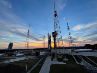 A United Launch Alliance rocket carrying the STP-3 mission for the U.S. military, including a NASA laser space communications experiment, stands atop its pad at Space Launch Copmlex 41 of the Cape Canaveral Space Force Station in Florida for a Dec. 5, 2021 launch. 
