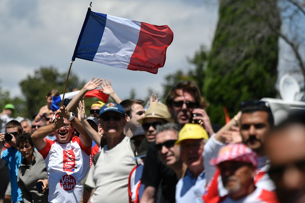 Fans line the roads during stage 12 at the Tour de France
