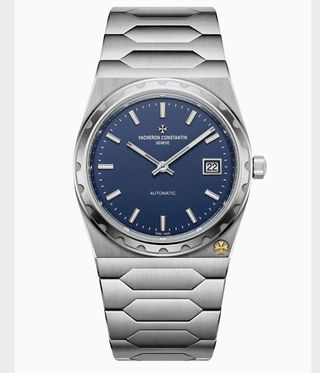 silver watch with blue dial