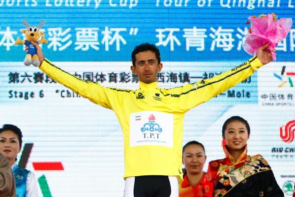 Hossein Alizadeh with the yellow jersey at podium