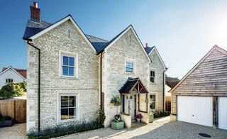 Timber frame Cotswold stone home in Wiltshire