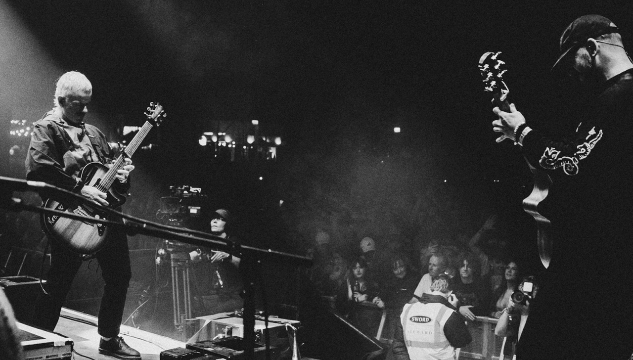 Black and white image of the Scratch live on stage