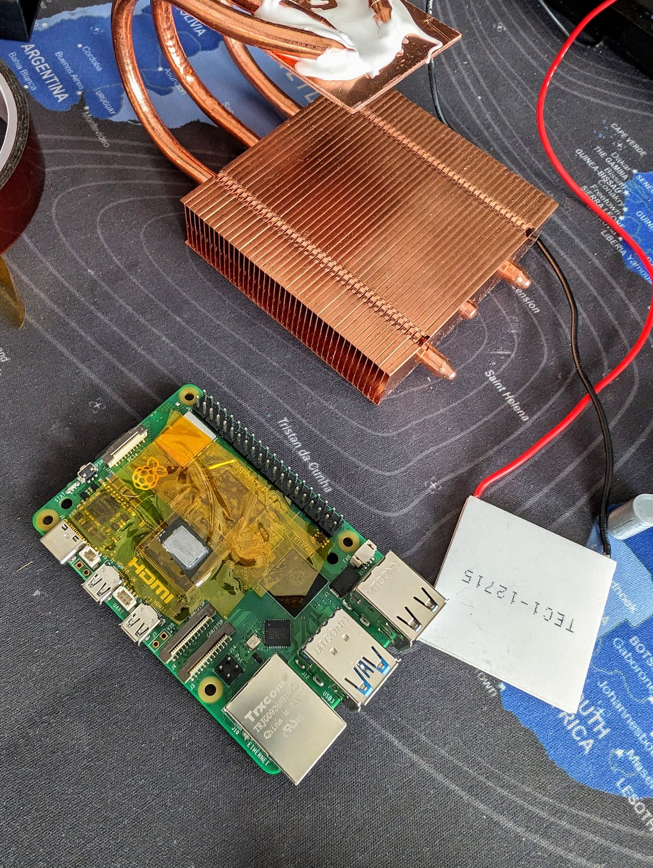 Raspberry Pi 5 delidded and cooled using a Peltier element