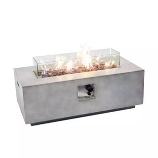 A rectangular grey concrete gas fire pit