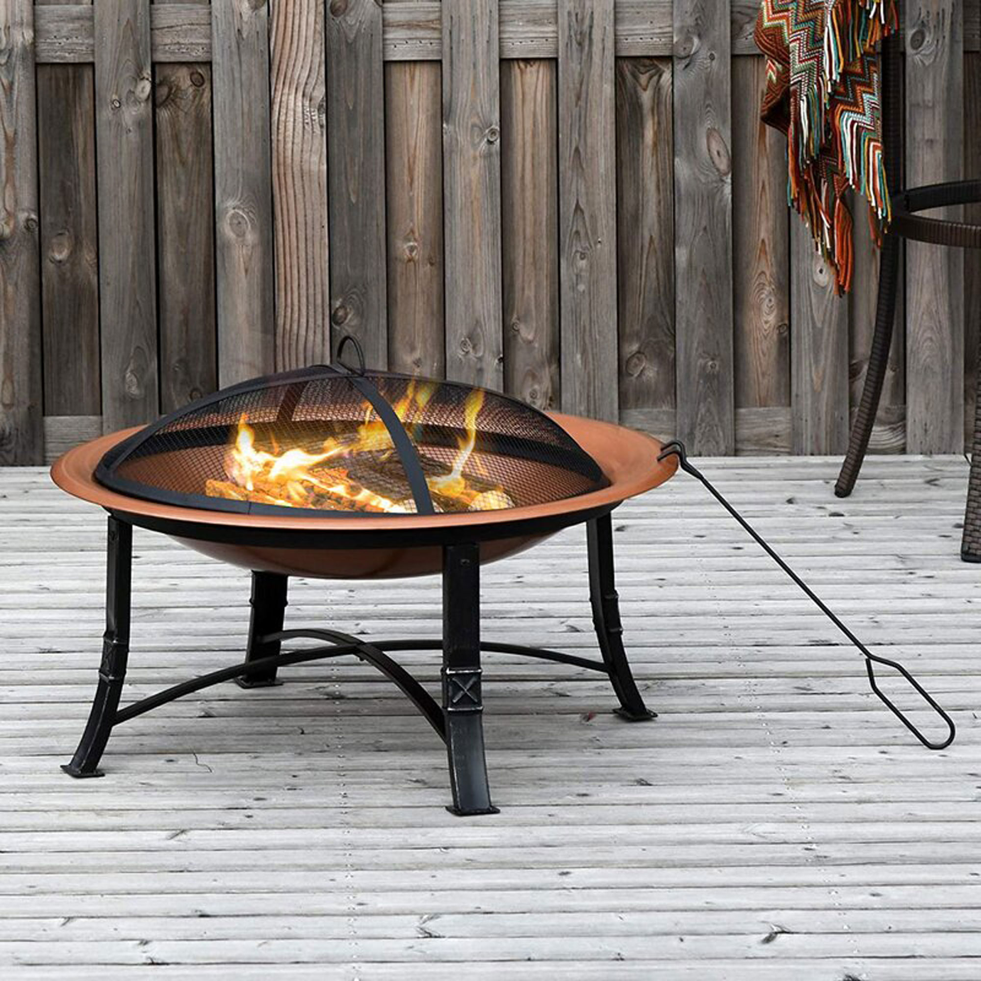 HOMCOM Wayfair Fire Pit on decking in garden