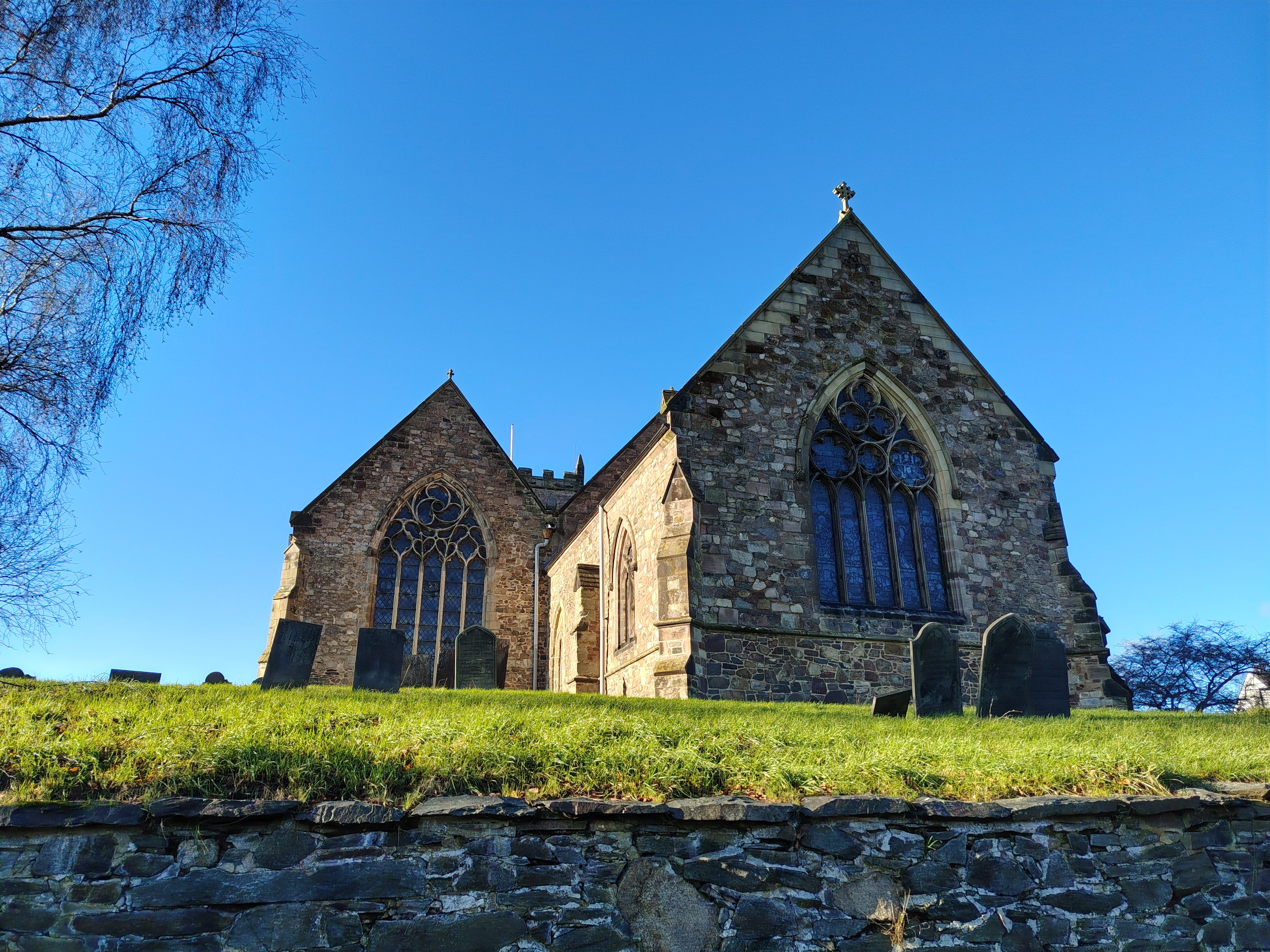 Stone church with large windows