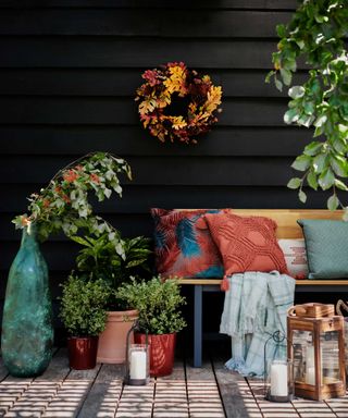 decking with autumn wreath and accessories from Dobbies