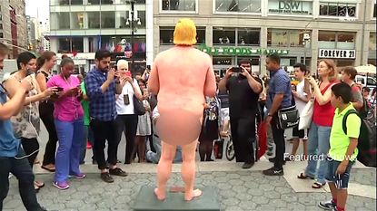 New Yorkers gawk at naked Donald Trump sculpture