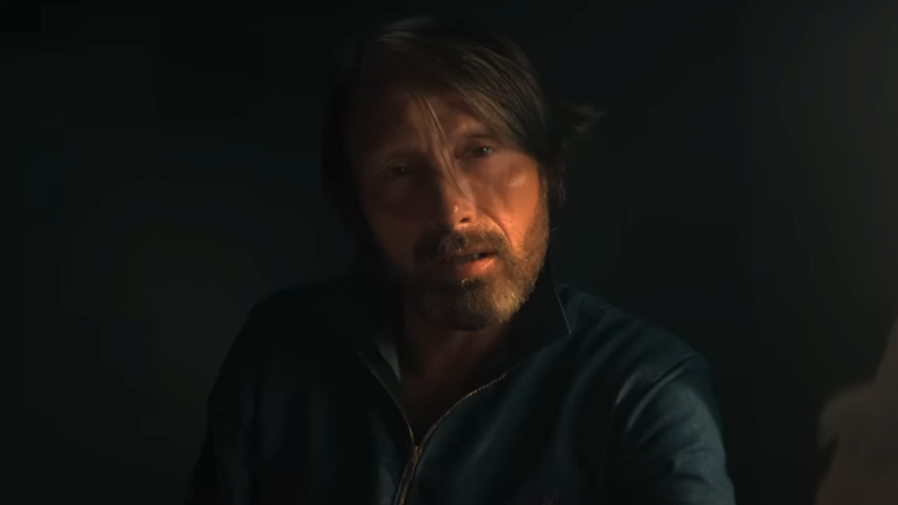 Mads Mikkelsen in dark room in Dust Bunny