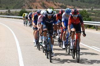 LA LAGUNA NEGRAVINUESA SPAIN SEPTEMBER 06 LR Jorge Arcas of Spain and Movistar Team and Geraint Thomas of The United Kingdom and Team INEOS Grenadiers compete in the breakaway during the 78th Tour of Spain 2023 Stage 11 a 1632km stage from Lerma to La Laguna Negra Vinuesa 1730m UCIWT on September 06 2023 in La Laguna NegraVinuesa Spain Photo by Tim de WaeleGetty Images