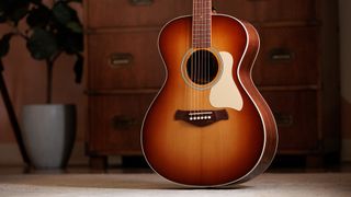 A photo of the Taylor Ben Harper Gold Label 512e Special Edition grand concert acoustic