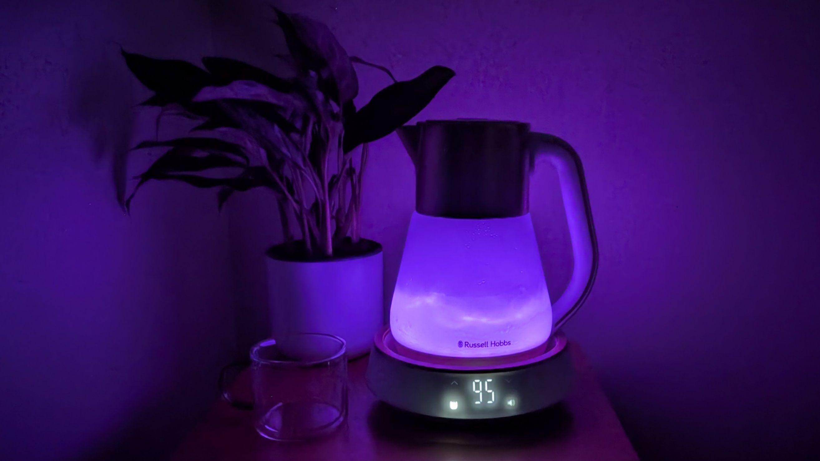 Russell Hobbs Calm Kettle boiling water while illuminated purple