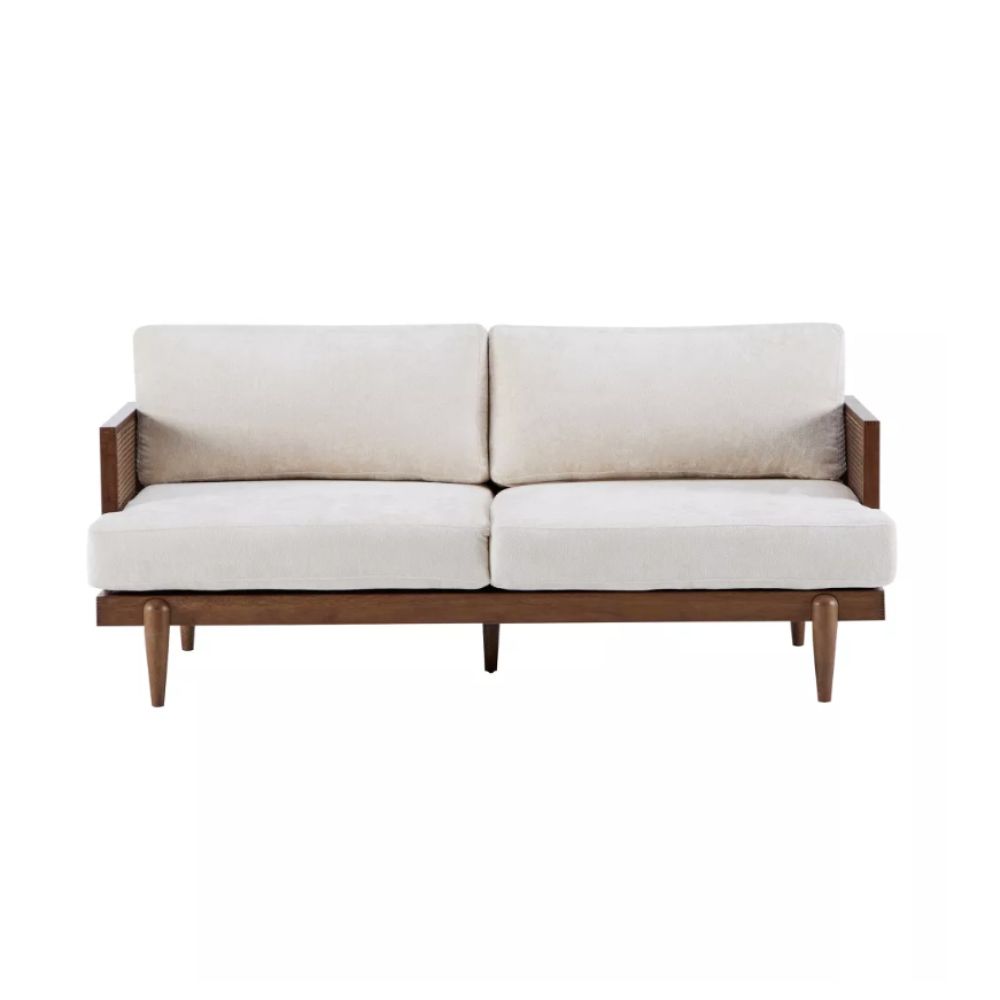 Wooden sofa with cream cushions