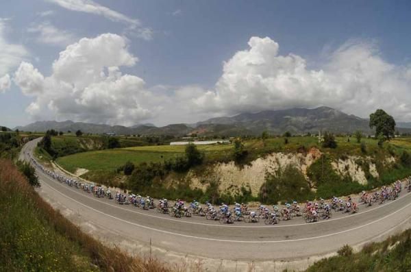 The peloton heads for the orange groves of Finike at the Tour of Turkey.