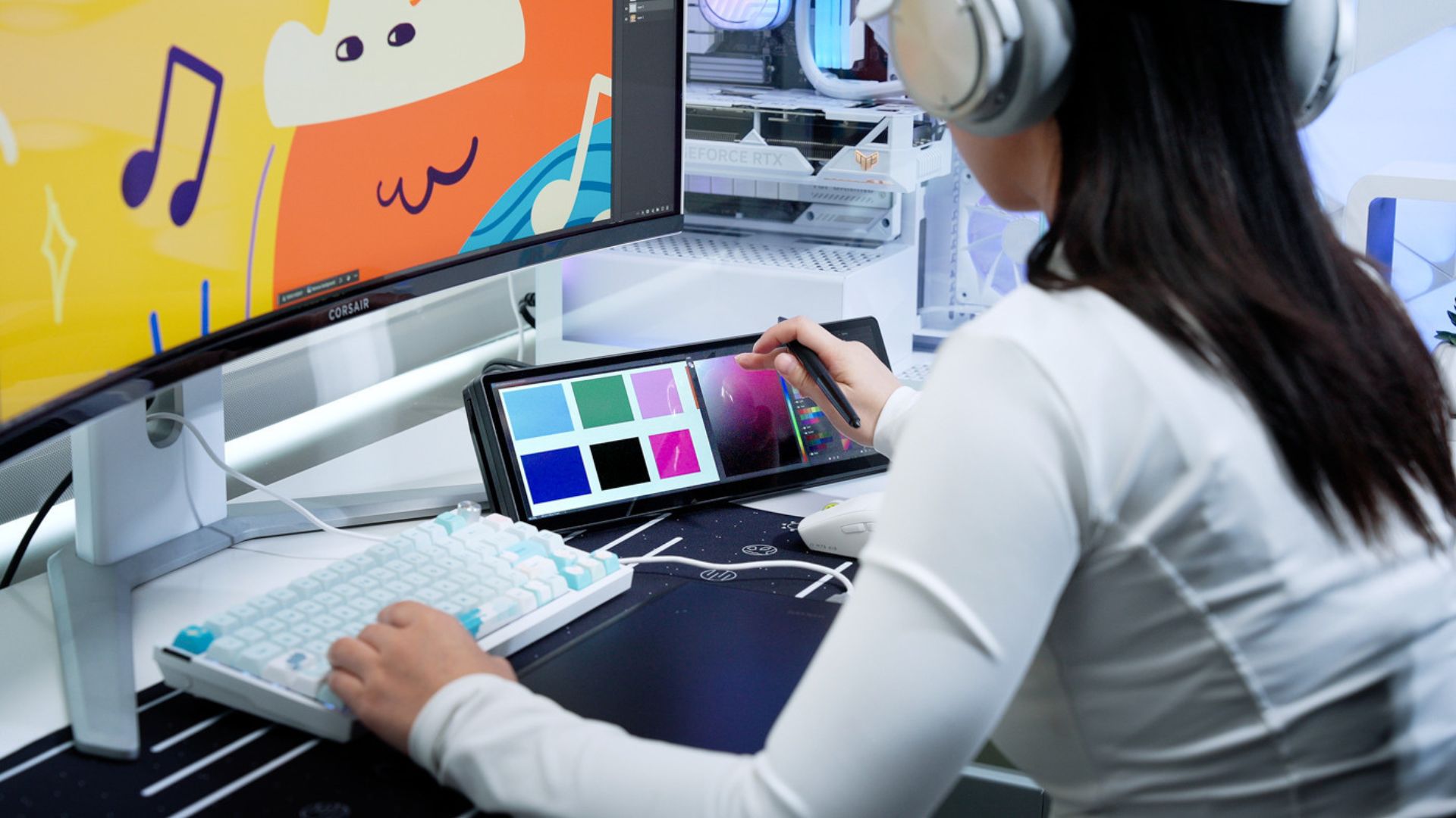 A Corsair Xeneon Edge marketing image showing a creative professional using the device for color grading