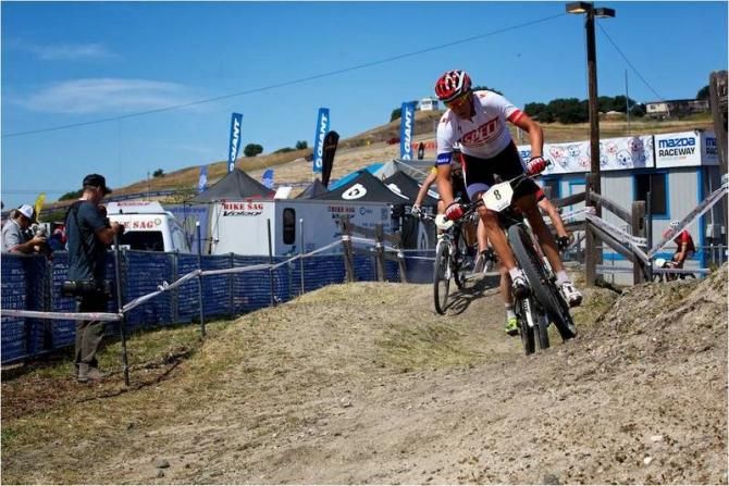 Todd Wells (Specialized) leading a pack through fun whoopty-do section