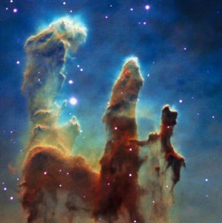 This colorful view of the iconic Pillars of Creation in the Eagle Nebula was created using the MUSE instrument on the Very Large Telescope in Chile operated by the European Southern Observatory.