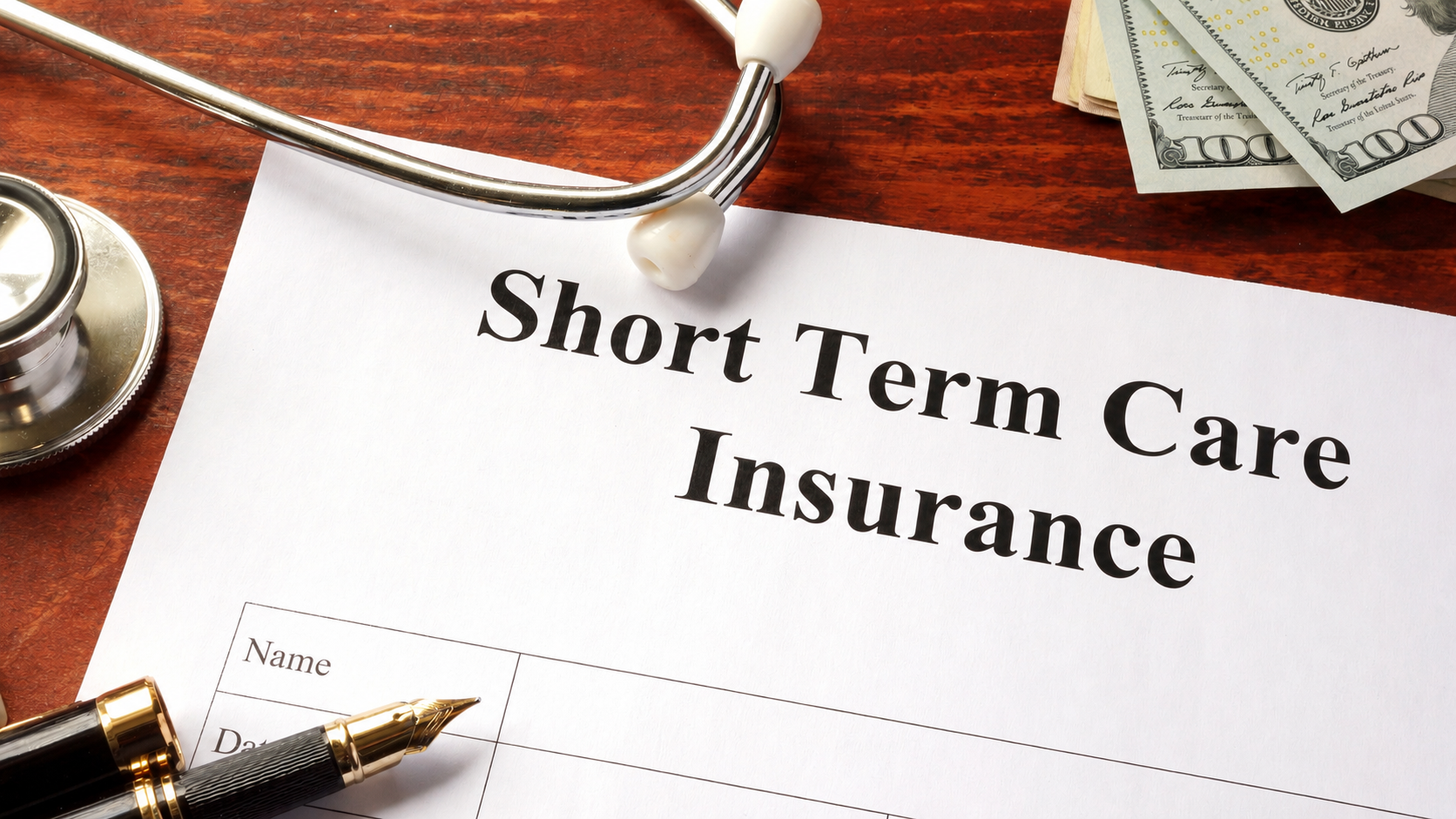 Short term care insurance document on a desk
