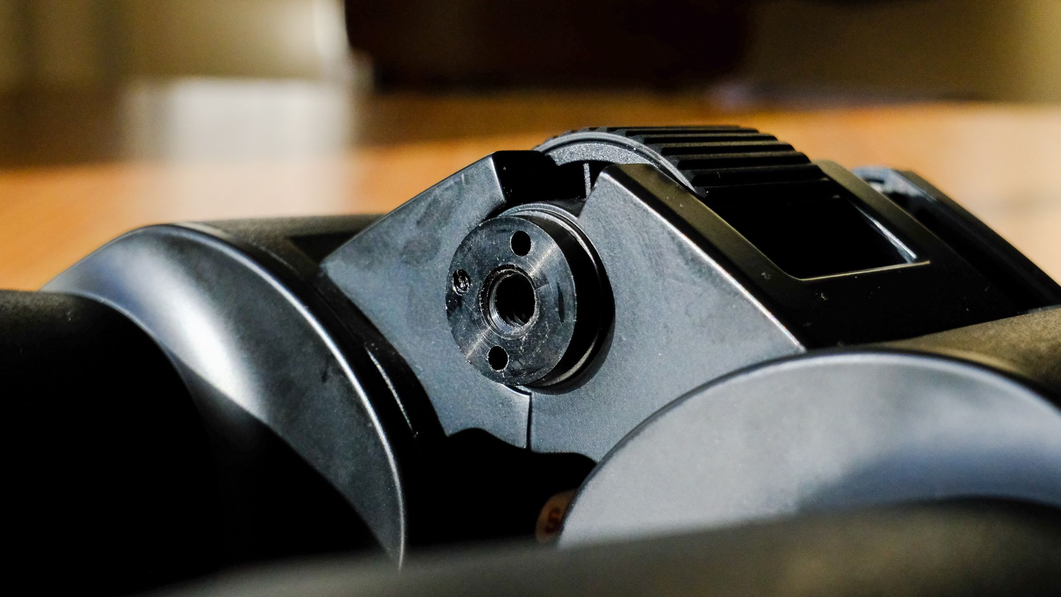 The tripod adapter socket on the Nikon Action 7x50 binoculars.