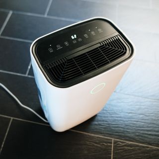 Dehumidifier in operation inside home