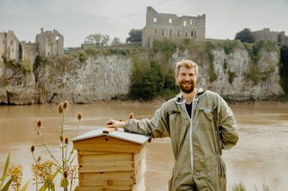 Mr Newell of Hive Mind with a beehive