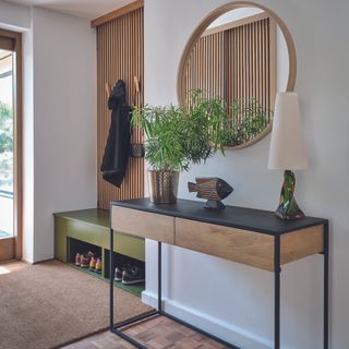 Hallway storage with wooden side table.