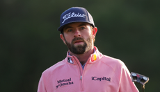 Cameron Young reacts after a missed putt