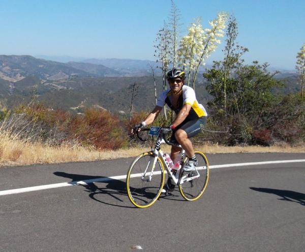 Sure Jeff is smiling now, but at this point he still has three miles of climbing