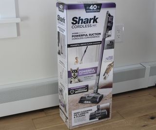 The box of the Shark Pet Cordless Stick Vacuum