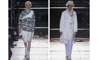 Left: model wearing a white and black patterned shirt with cross-body buckle and white shorts. Right: model wearing long white duffel coat and padded dinosaur-style headpiece